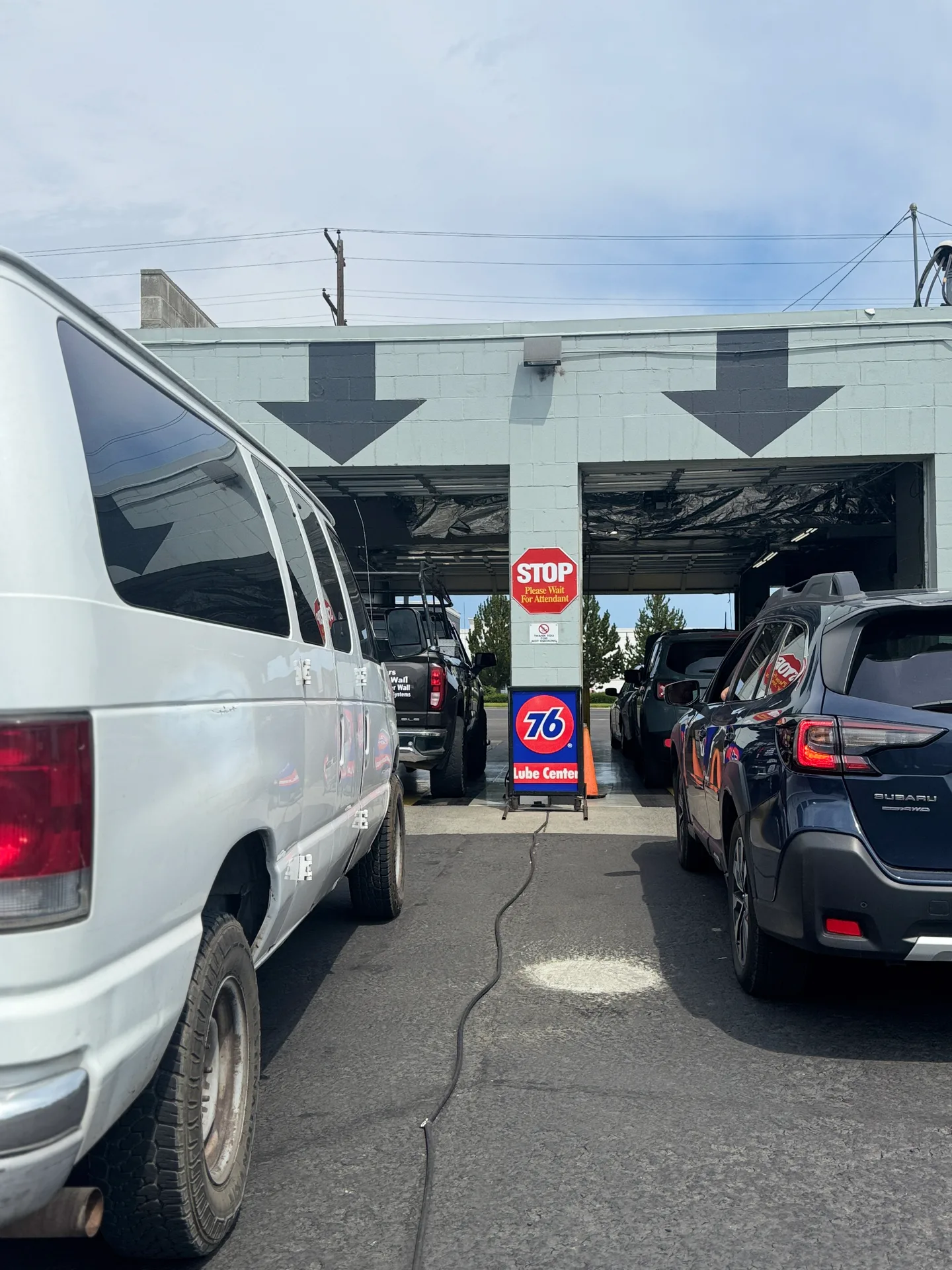 Busy service lane with multiple vehicles